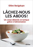 Couverture du livre "Lâchez-nous les abdos" de Gilles Bacigalupo. Image d'un bol blanc avec de la salade. Table blanche et fourchette.